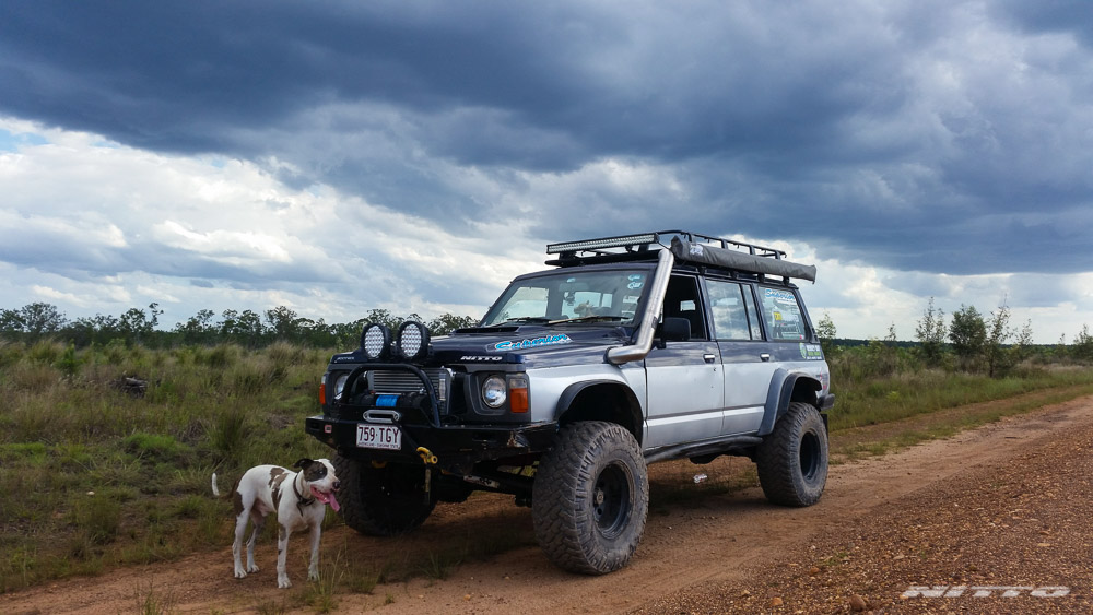 GQ Nissan Patrol With Dog And Clouds